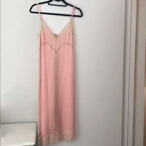 Pale pink long silk slip dress with lace detail